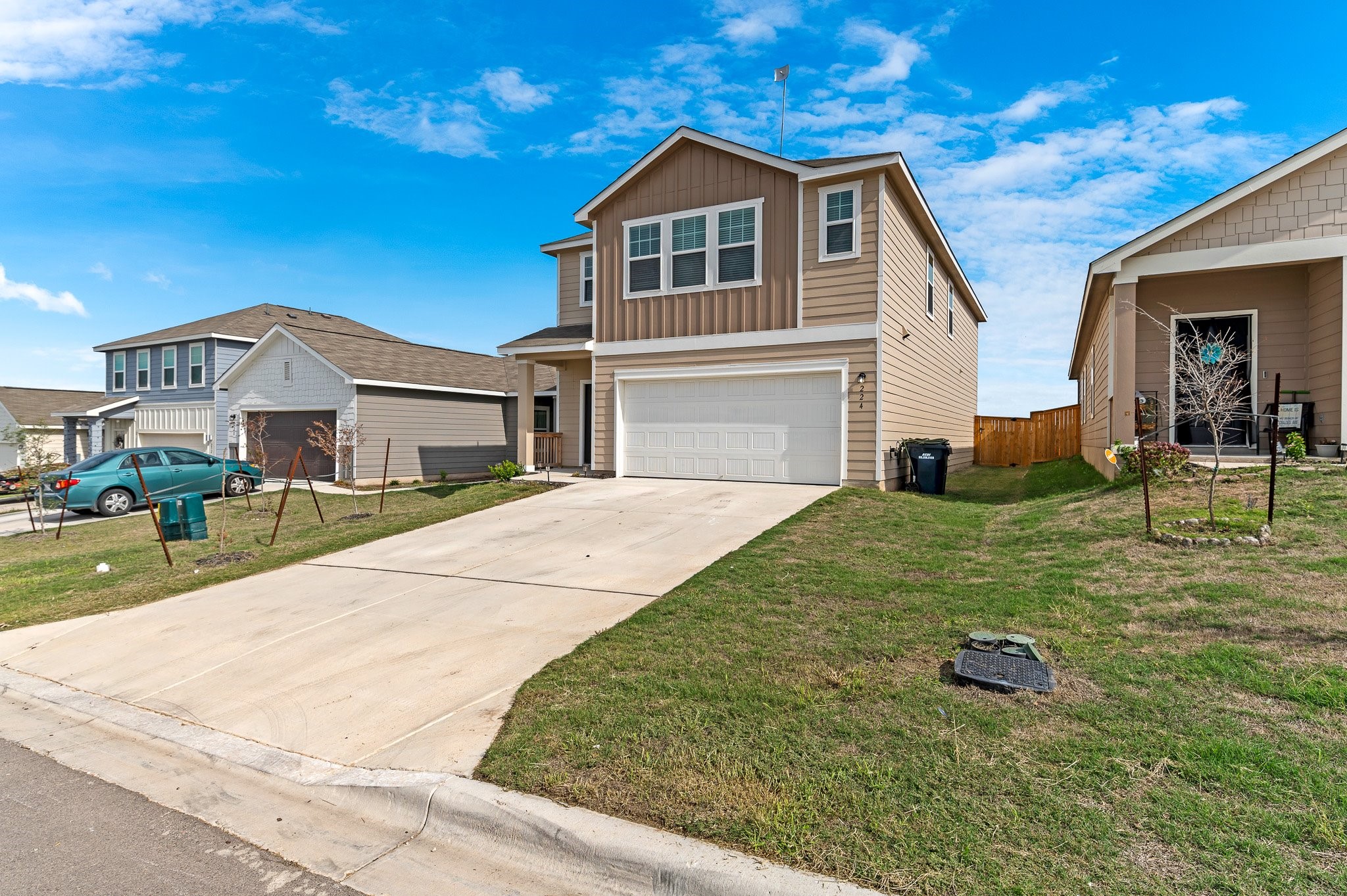 224 Night Riders Way Jarrell, TX 76537 - Photo 3 of 40 a front view of a house with a yard
