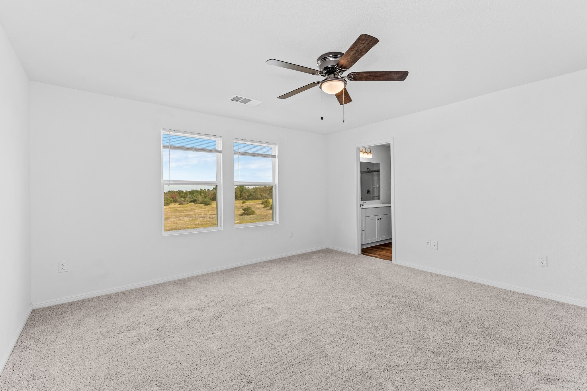 224 Night Riders Way Jarrell, TX 76537 - Photo 32 of 40 an empty room with windows and closet