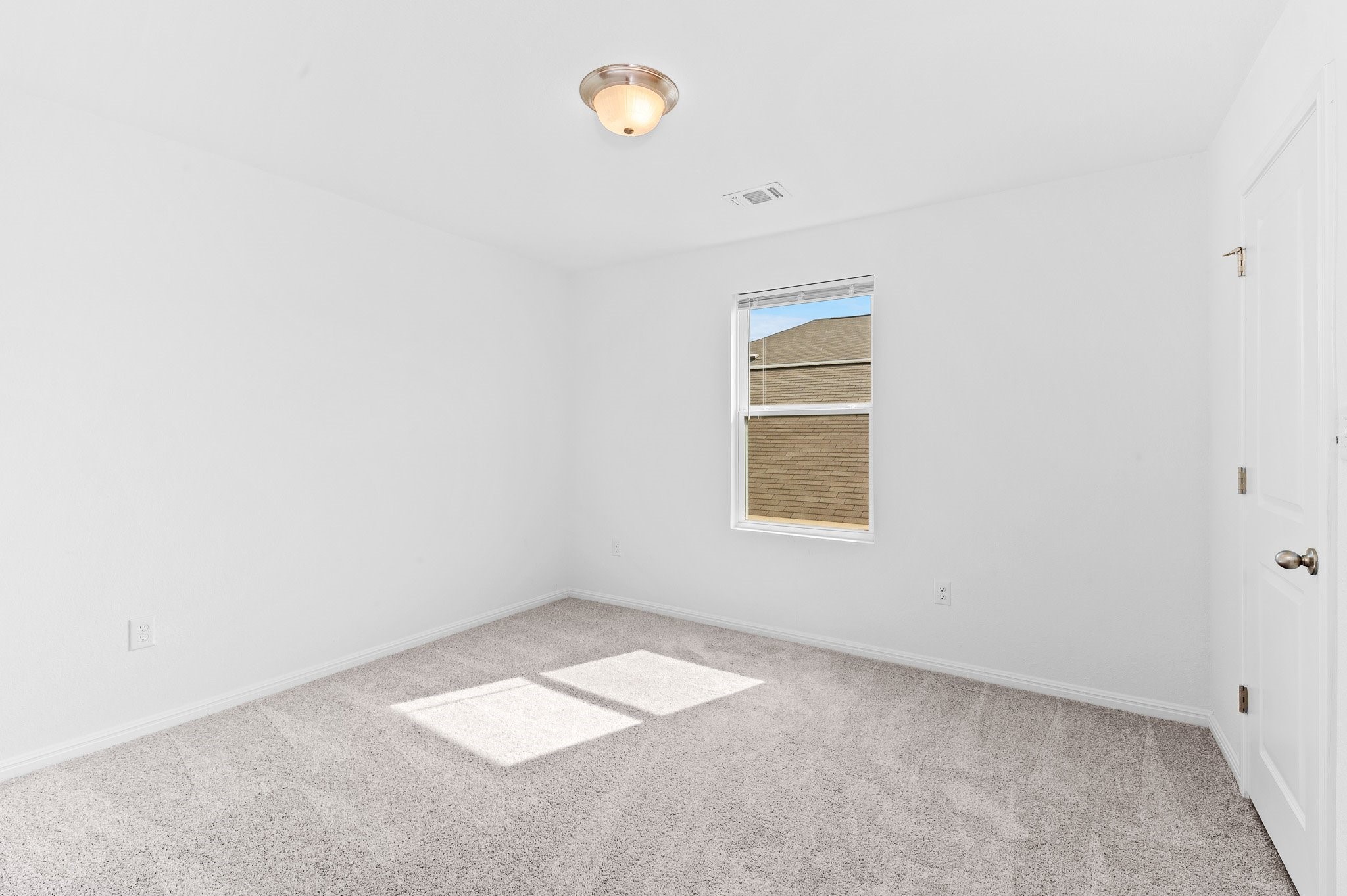 224 Night Riders Way Jarrell, TX 76537 - Photo 39 of 40 an empty room with a window