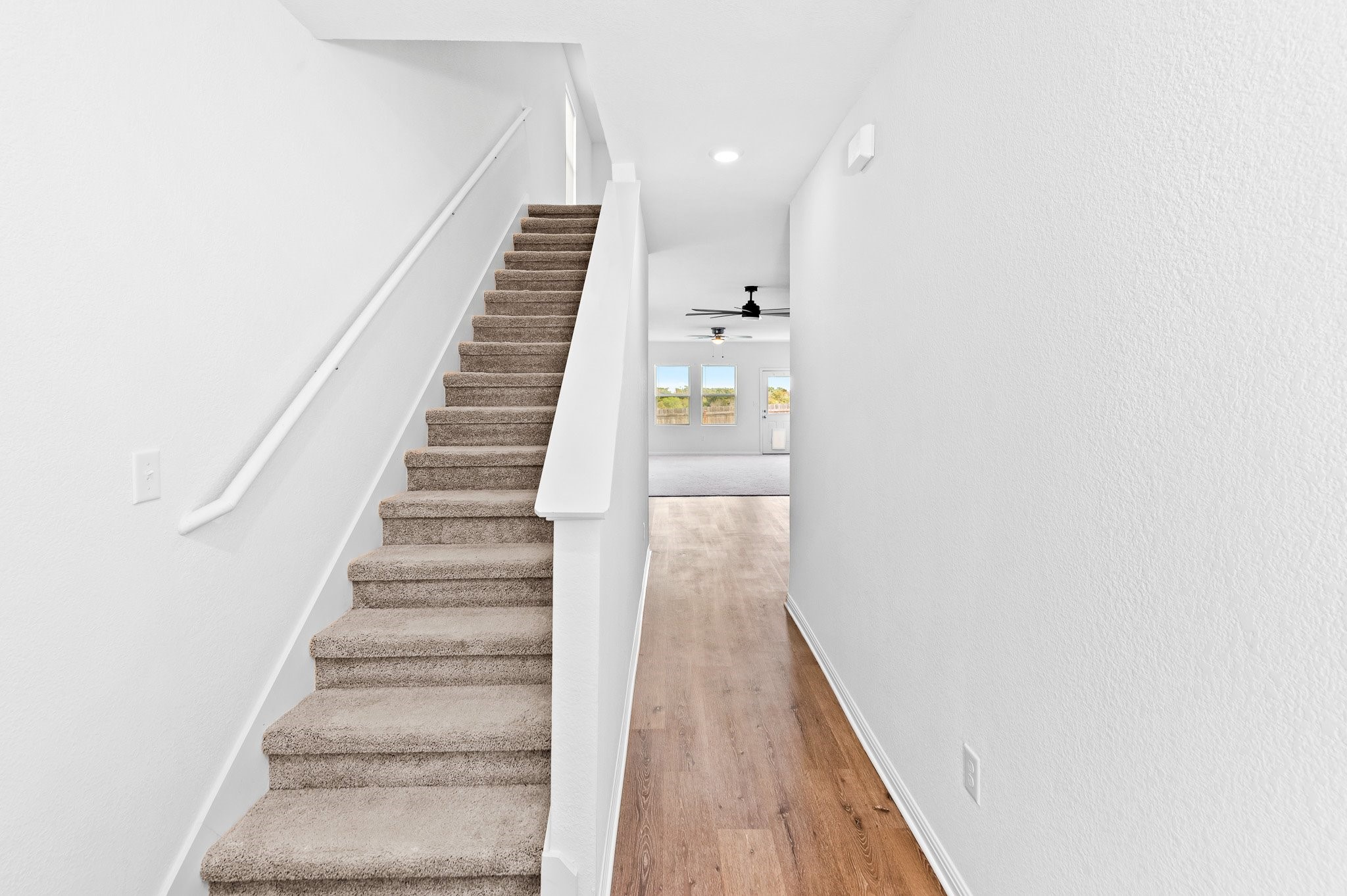 224 Night Riders Way Jarrell, TX 76537 - Photo 5 of 40 a view of entryway with wooden floor