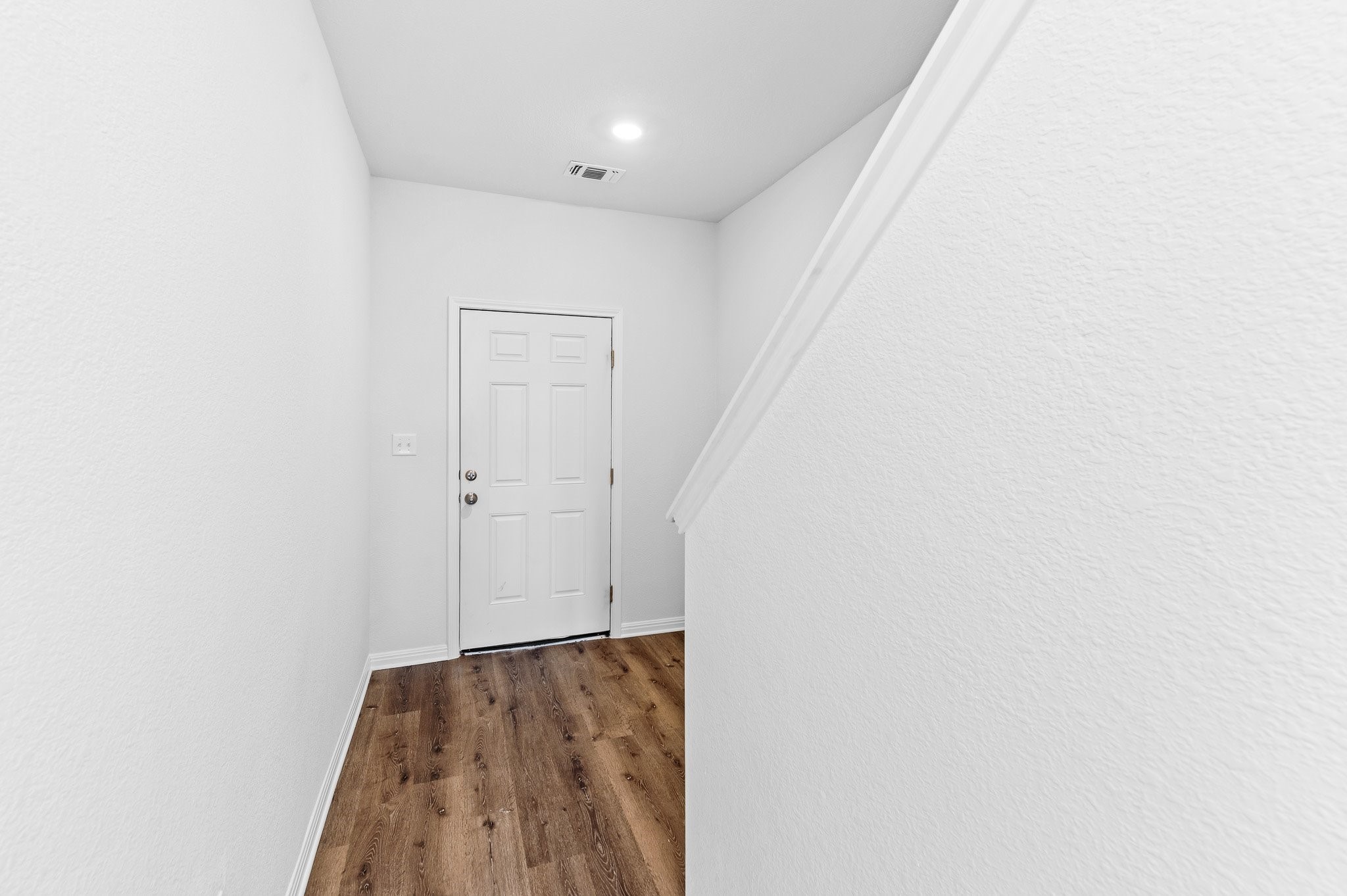 224 Night Riders Way Jarrell, TX 76537 - Photo 6 of 40 a view of a room with an empty space and a hallway