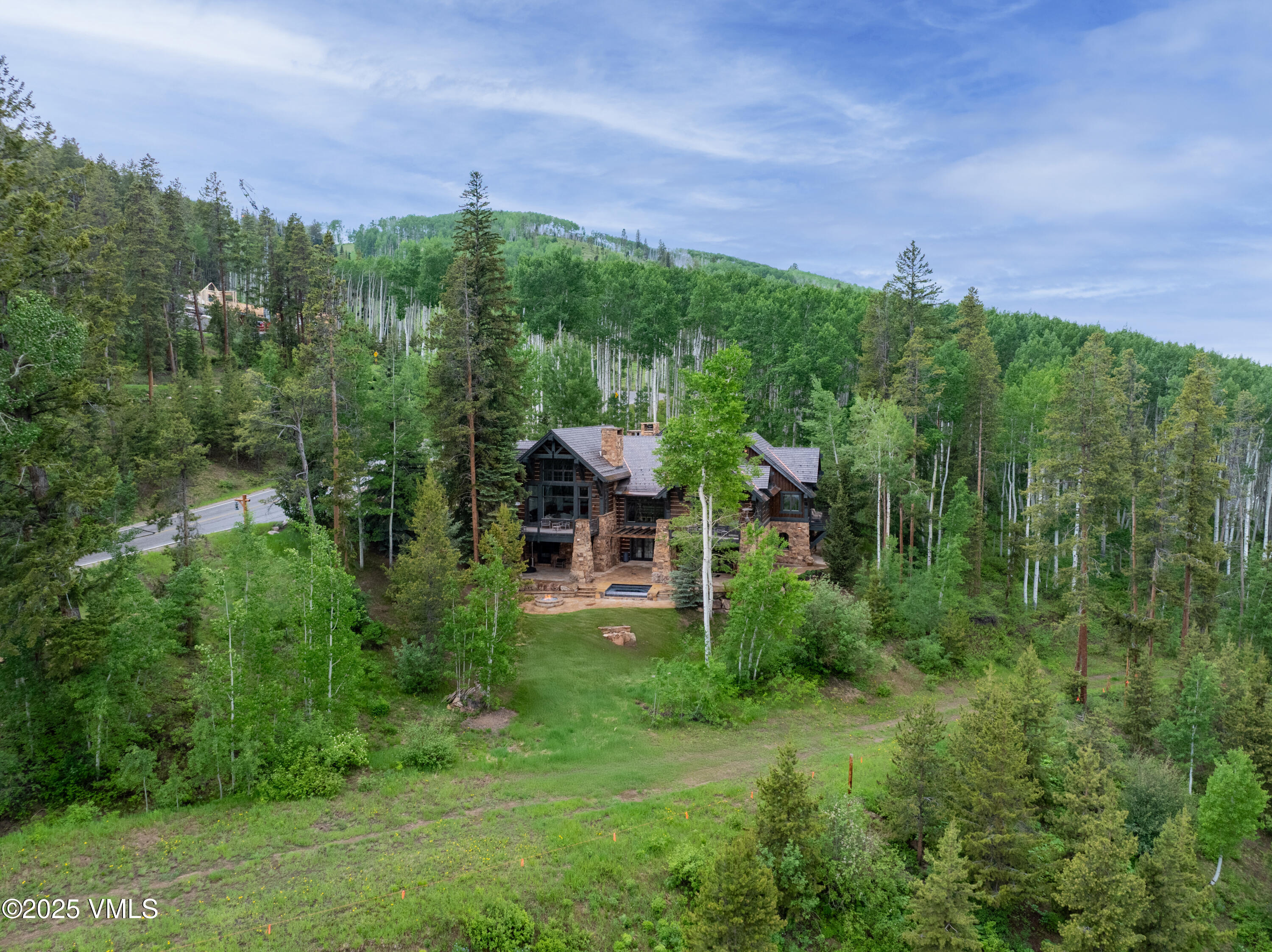 2584 Daybreak Ridge Road Avon, CO 81620 - Photo 13 of 53 2506_2584_daybreak_ridge_summer_aerial_a