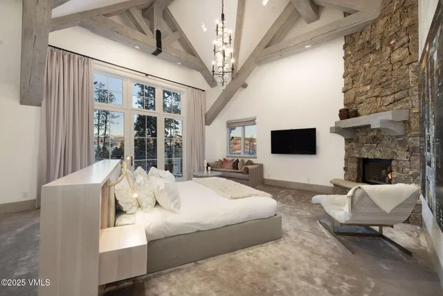 a dining room with furniture and a fireplace