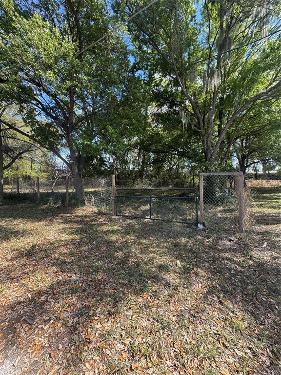 0 Denmark Street Bartow, FL 33830 - Photo 2 of 6 a backyard of a house with lots of green space