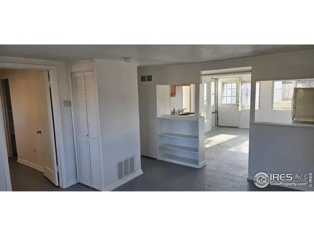 a open hall with a bench