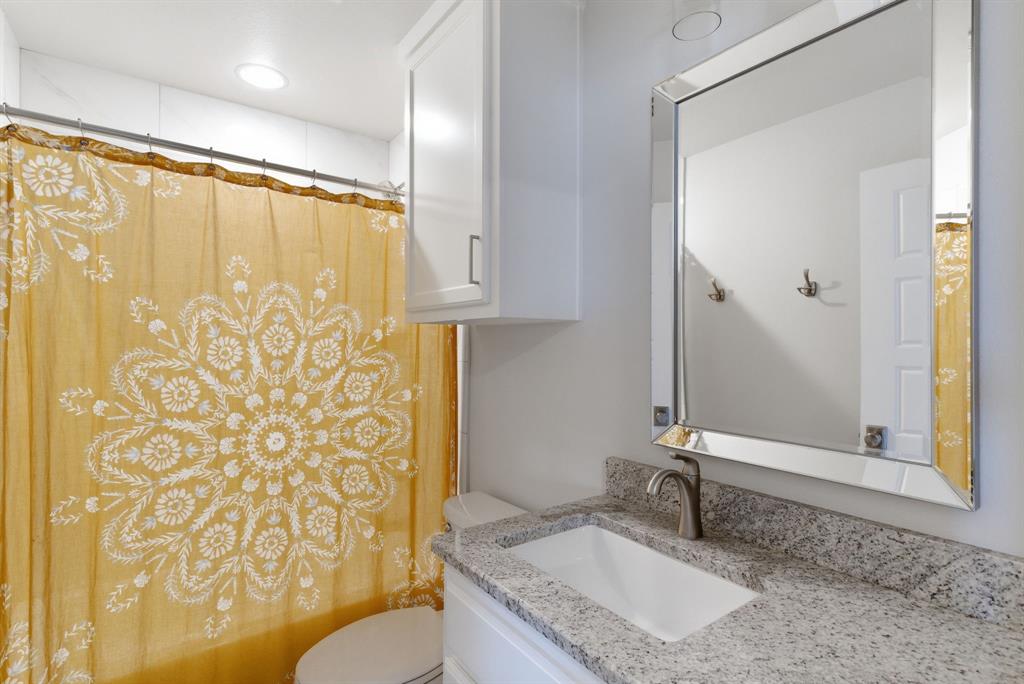 4600 B Old Brock Road Weatherford, TX 76087 - Photo 27 of 40 Bathroom featuring vanity and a shower with curtain