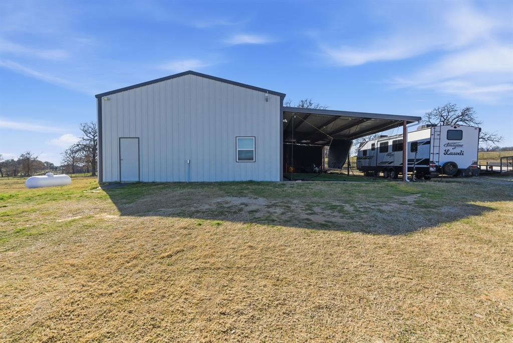 4600 B Old Brock Road Weatherford, TX 76087 - Photo 5 of 40 View of pole building featuring a lawn and a carport