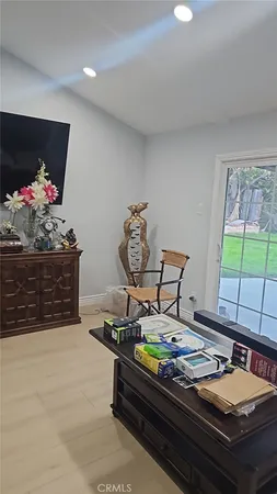 a view of a floor to ceiling window and a living room