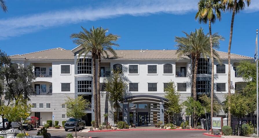 a view of multiple house with a yard