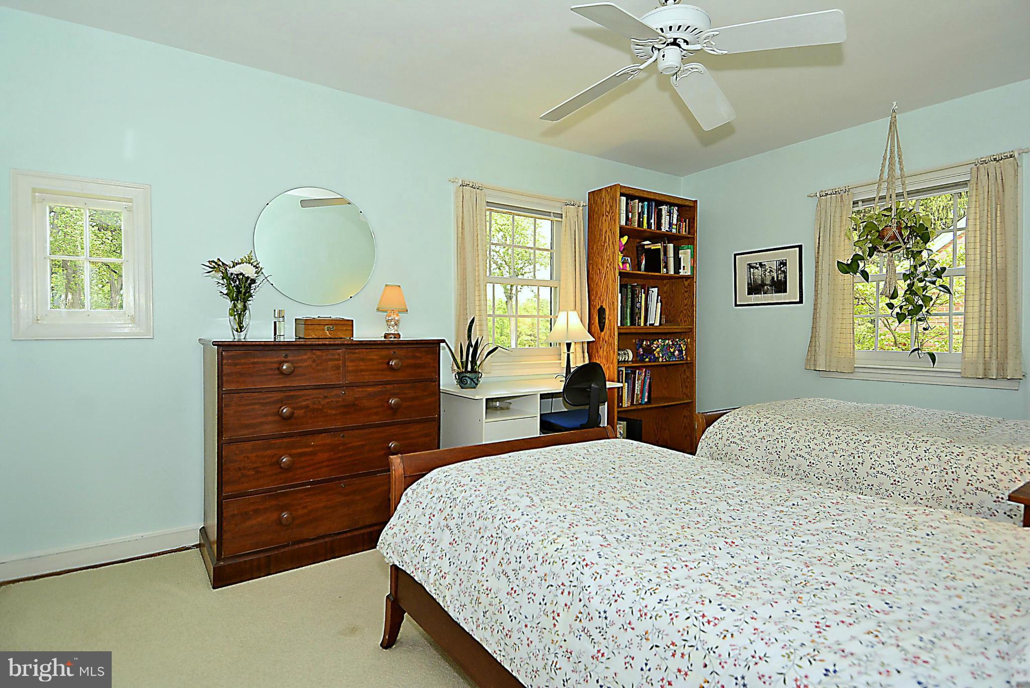 510 Ashford Road Silver Spring, MD 20910 - Photo 14 of 30 a bedroom with a bed and a dresser