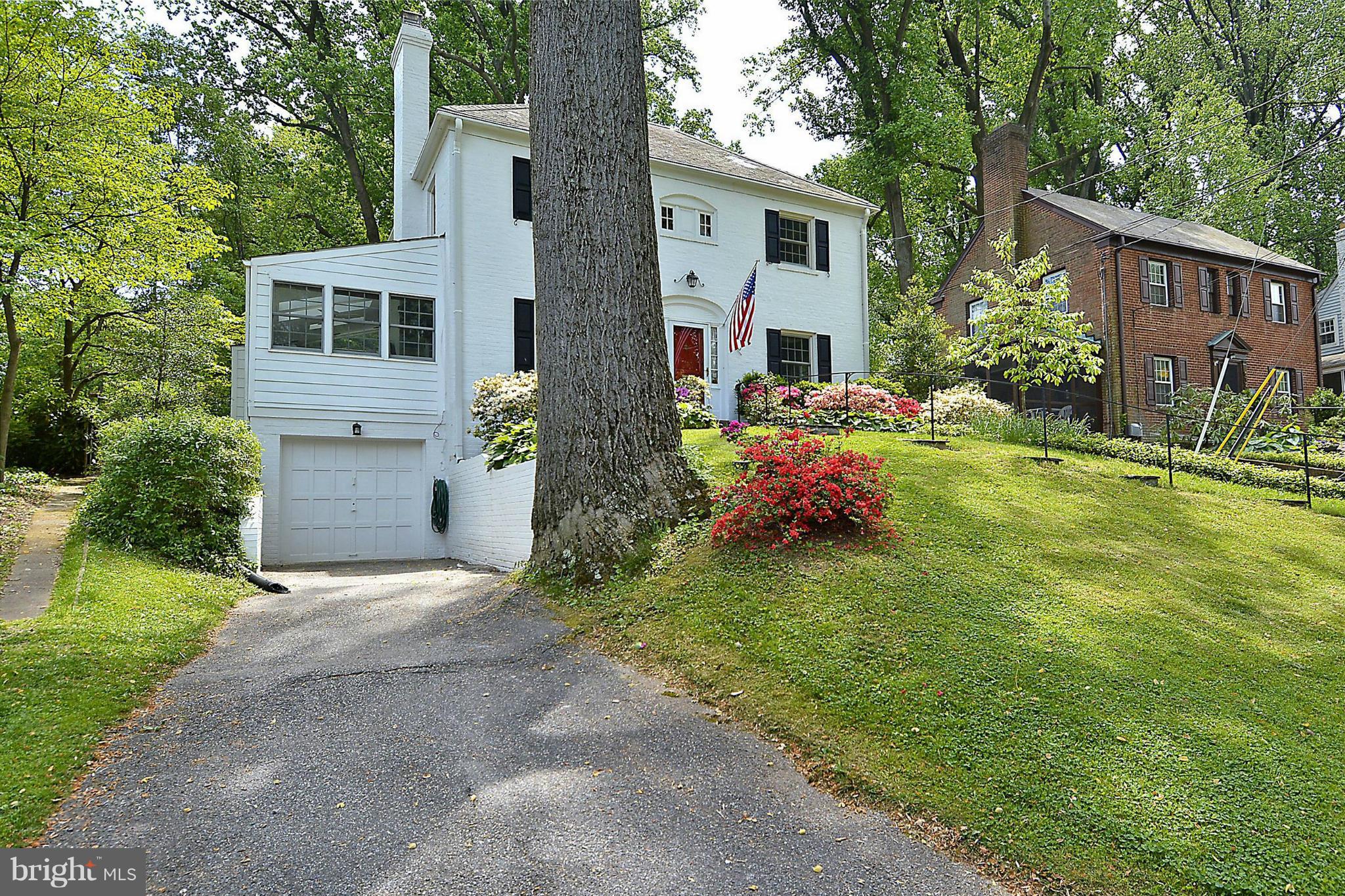 510 Ashford Road Silver Spring, MD 20910 - Photo 3 of 30 a front view of a house with garden
