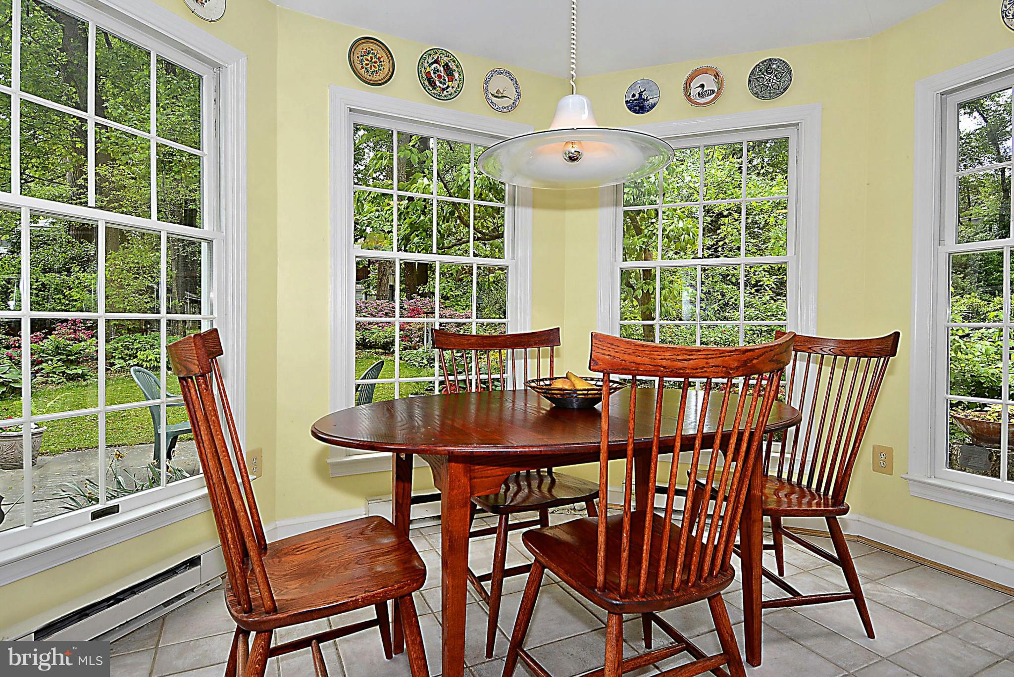 510 Ashford Road Silver Spring, MD 20910 - Photo 8 of 30 a view of a dining room with furniture window and outside view