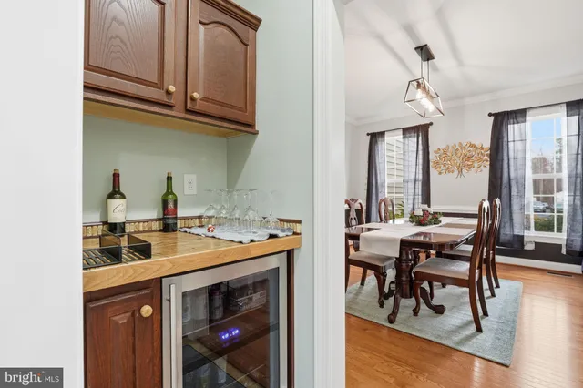 a utility room with sink dryer and washer