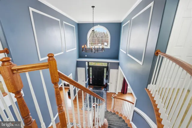 a view of a hallway with staircase