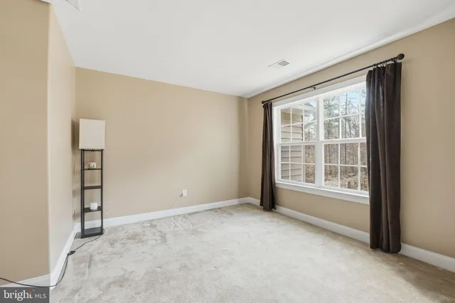a large bathroom with a double vanity sink shower and a mirror