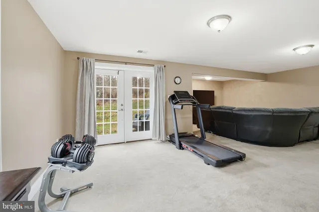 a room with furniture and a flat screen tv