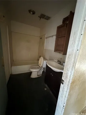 a bathroom with a sink and a toilet