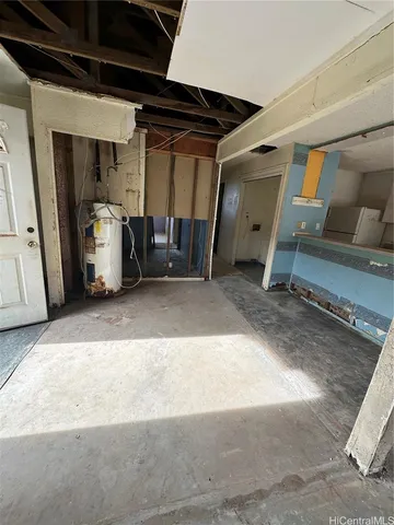 a view of a garage with walk in closet