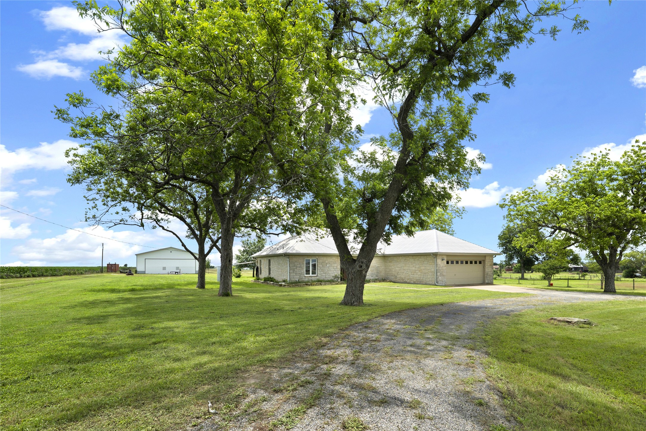 1005 East Buttercup Road Taylor, TX 76574 - Photo 6 of 38 a view of a house with a tree in a yard