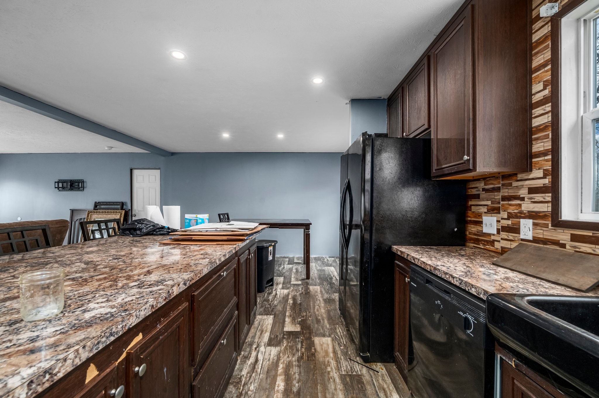 6684 Wesley Ridge Road Lyles, TN 37098 - Photo 15 of 37 a kitchen with a stove and a refrigerator