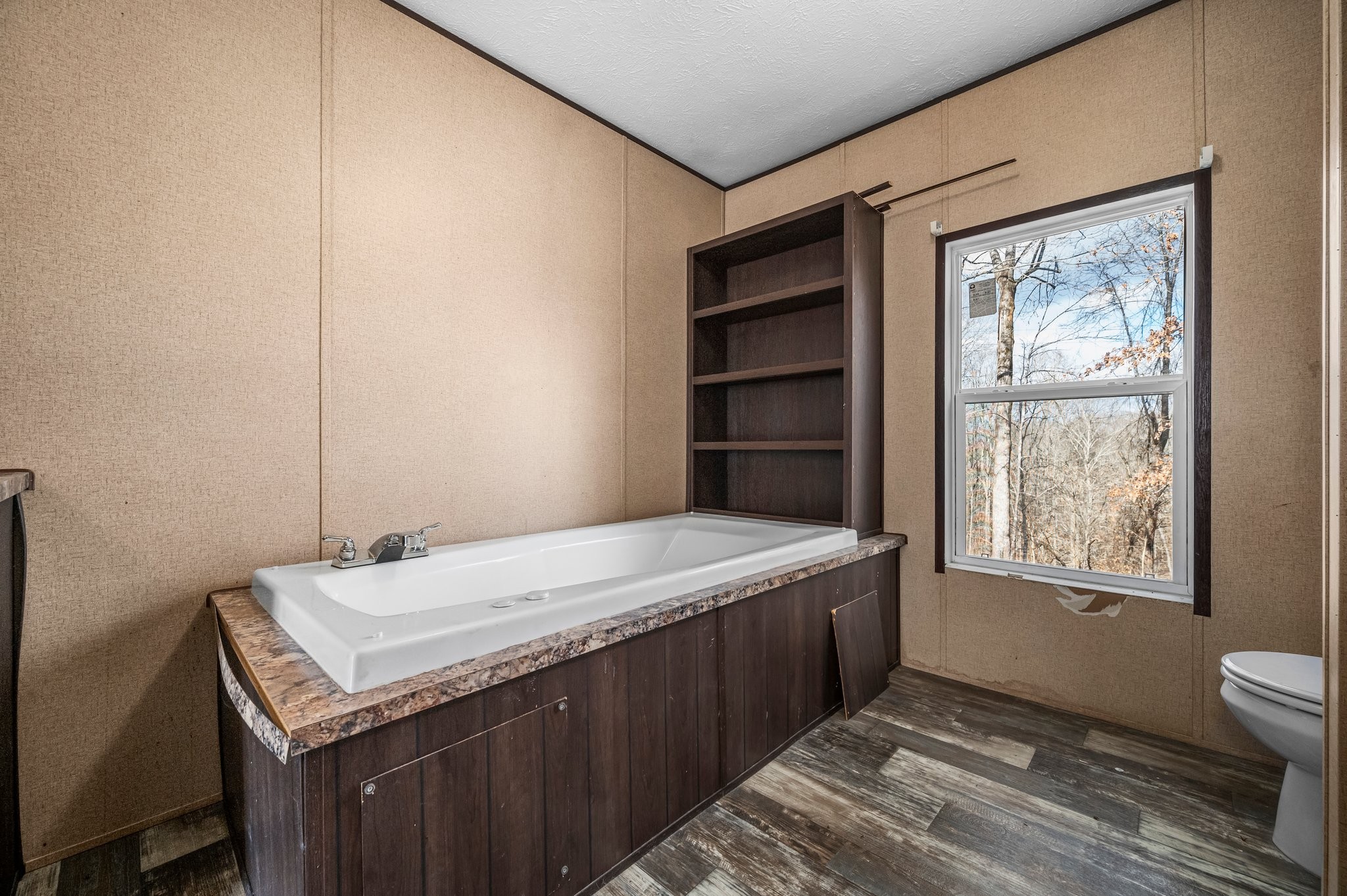 6684 Wesley Ridge Road Lyles, TN 37098 - Photo 20 of 37 a bedroom with a bed and a window