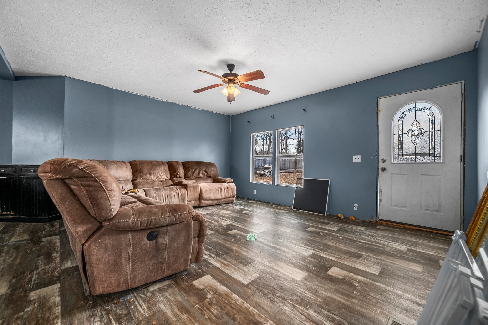 6684 Wesley Ridge Road Lyles, TN 37098 - Photo 7 of 37 a living room with furniture and a flat screen tv