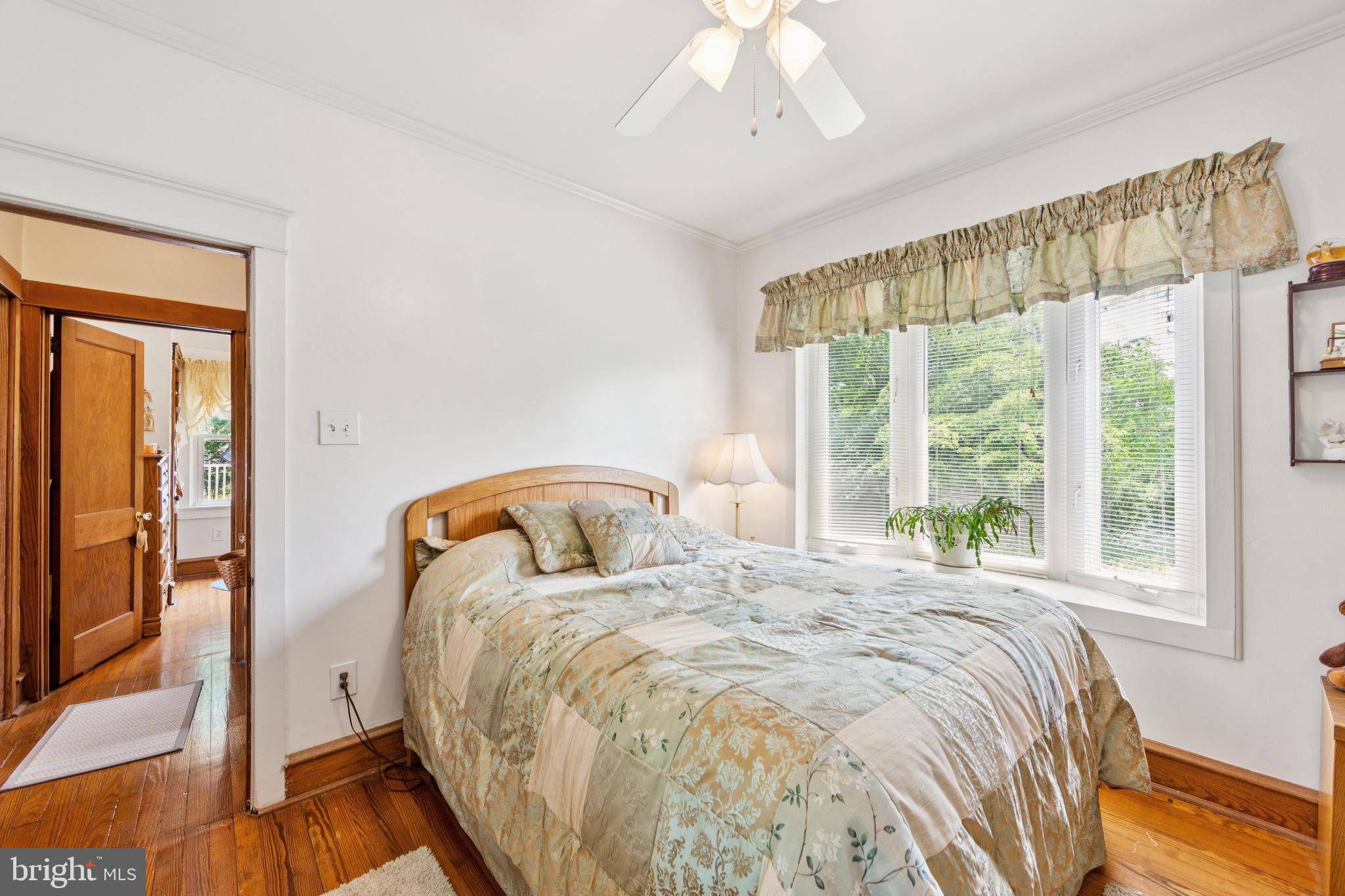 615 Convent Road Aston, PA 19014 - Photo 21 of 39 a bedroom with a bed and a large window