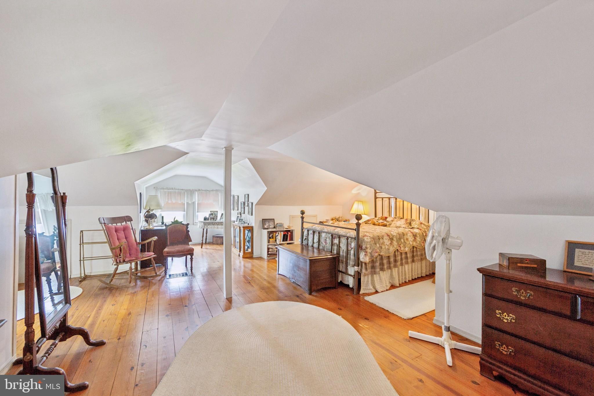 615 Convent Road Aston, PA 19014 - Photo 25 of 39 a living room with lots of furniture hardwood floor and a ceiling fan