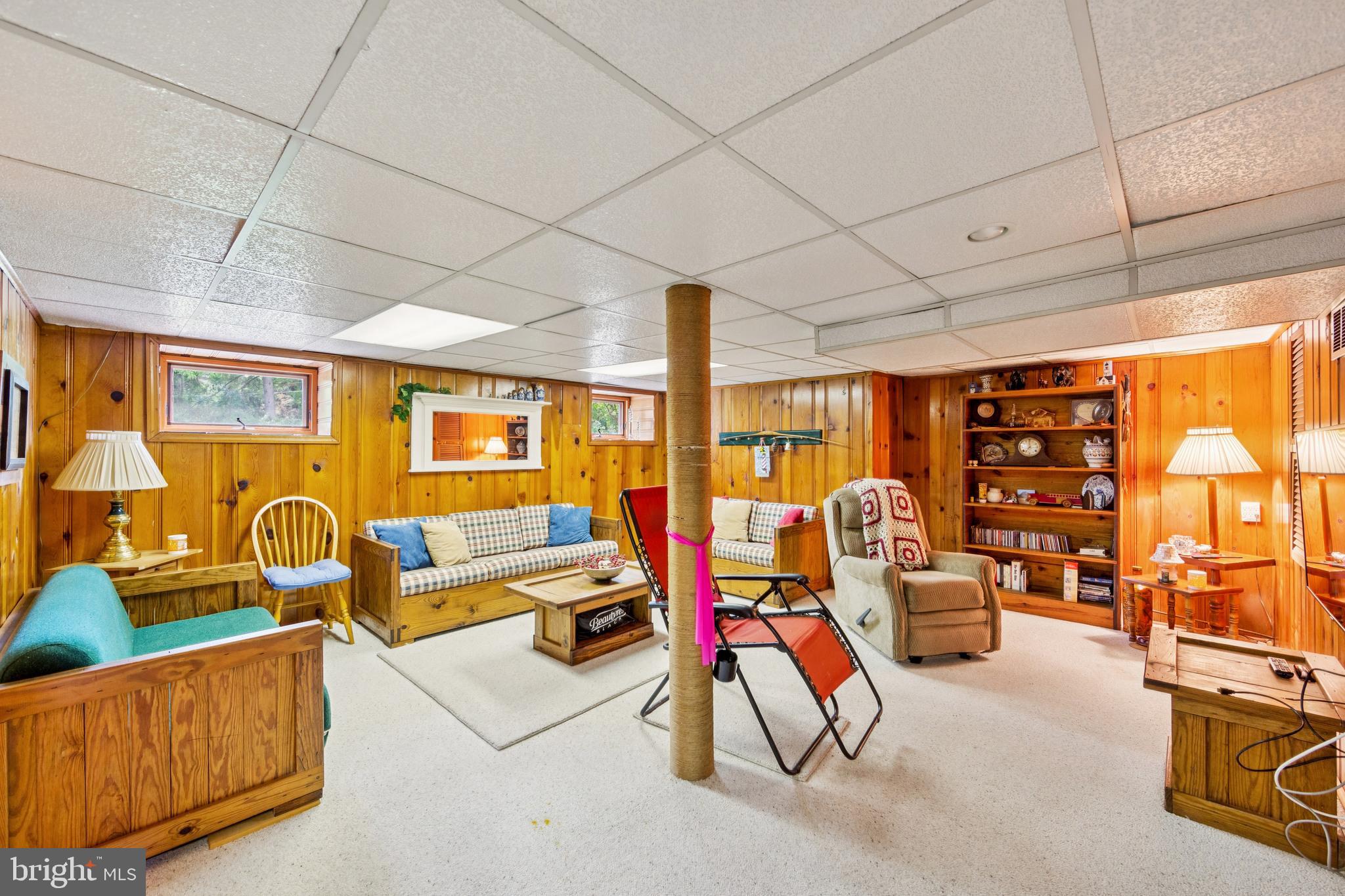 615 Convent Road Aston, PA 19014 - Photo 29 of 39 a living room with lots of furniture and a flat screen tv