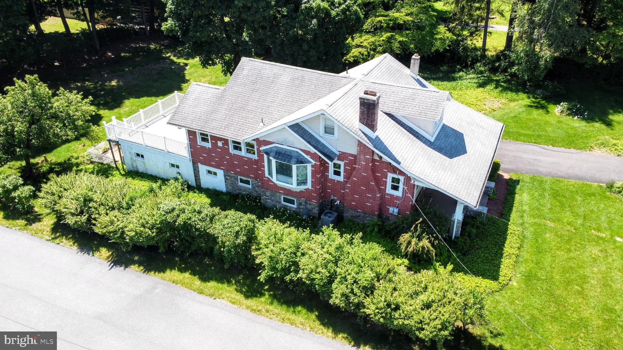 615 Convent Road Aston, PA 19014 - Photo 36 of 39 an aerial view of a house with a yard and fountain