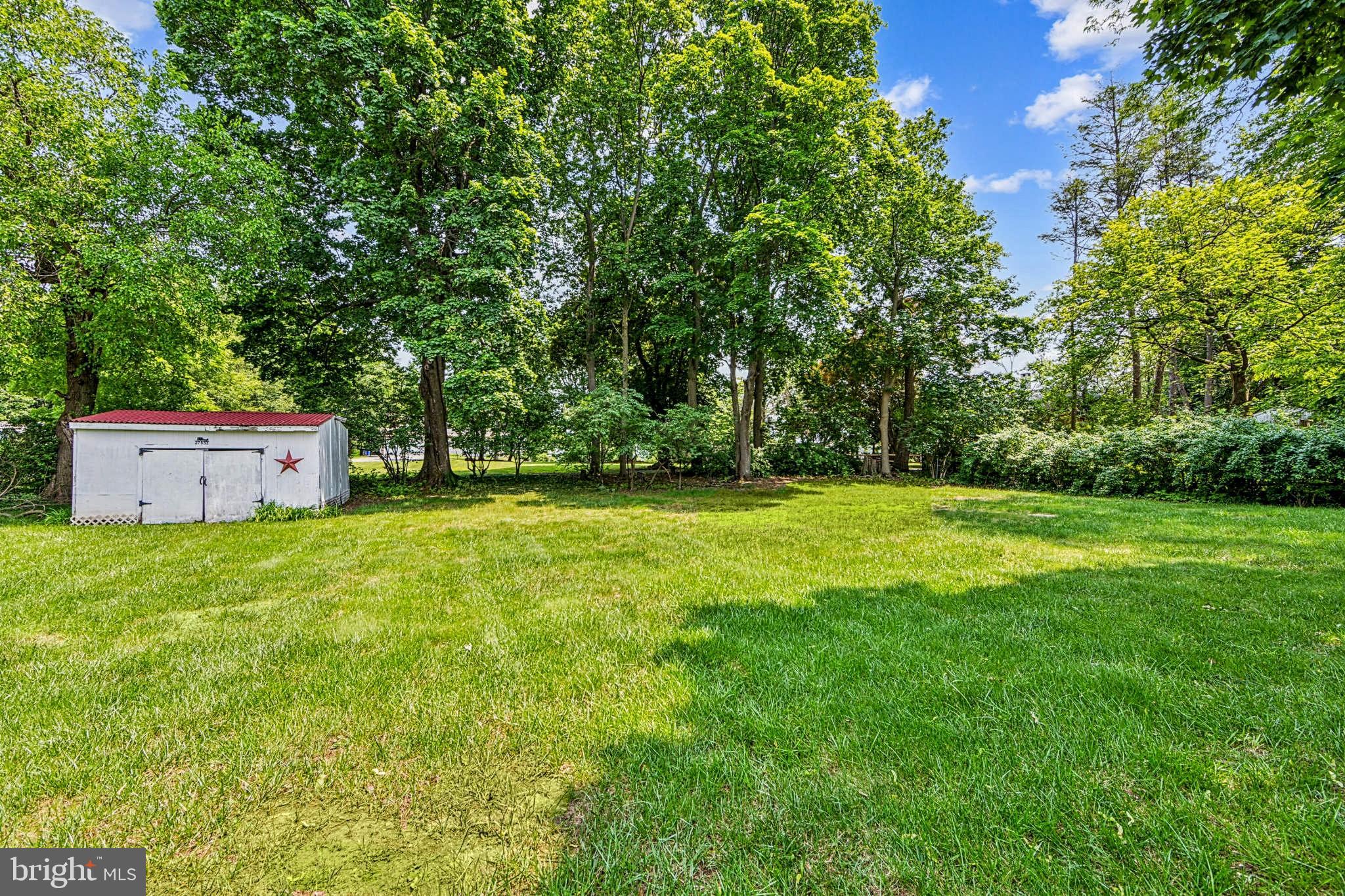 615 Convent Road Aston, PA 19014 - Photo 38 of 39 a backyard of a house with lots of green space
