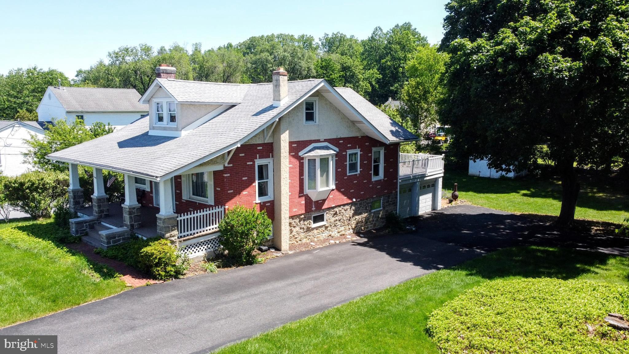 615 Convent Road Aston, PA 19014 - Photo 7 of 39 a aerial view of a house with yard and green space