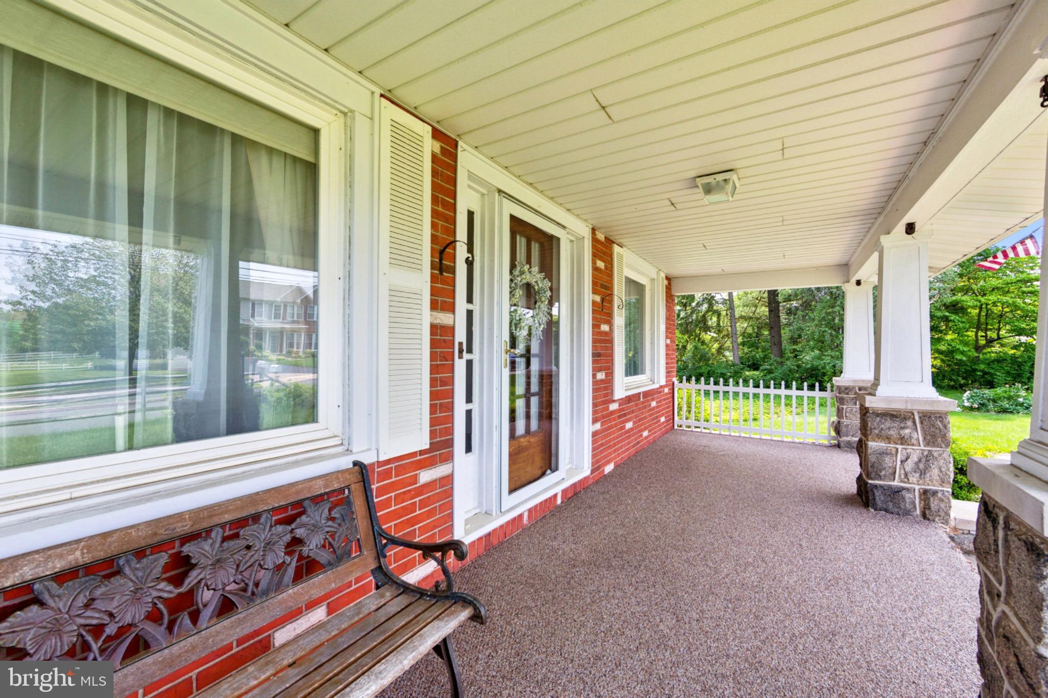 615 Convent Road Aston, PA 19014 - Photo 8 of 39 a view of a porch with furniture and floor to ceiling window