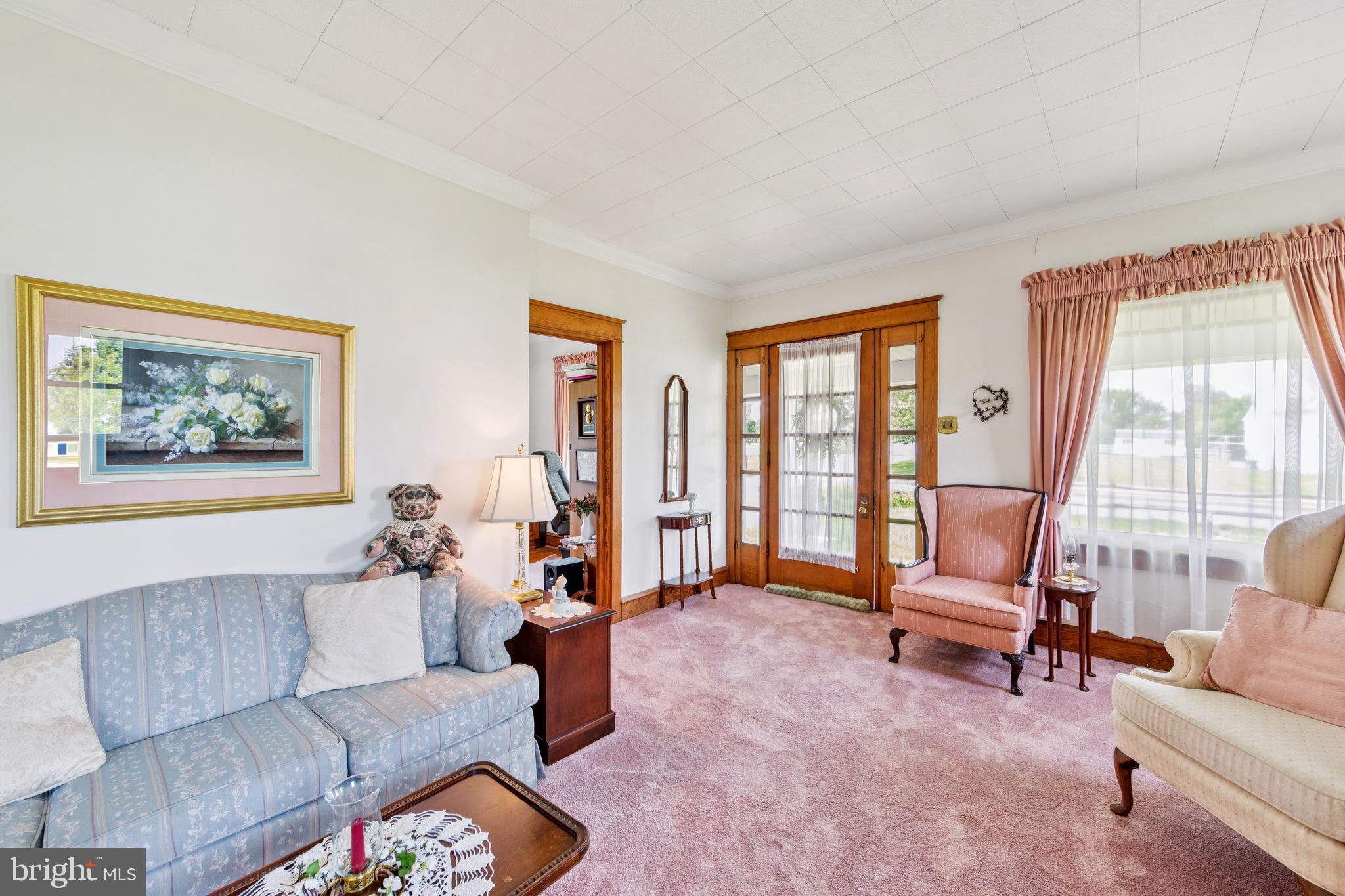 615 Convent Road Aston, PA 19014 - Photo 10 of 39 a living room with furniture and a large window