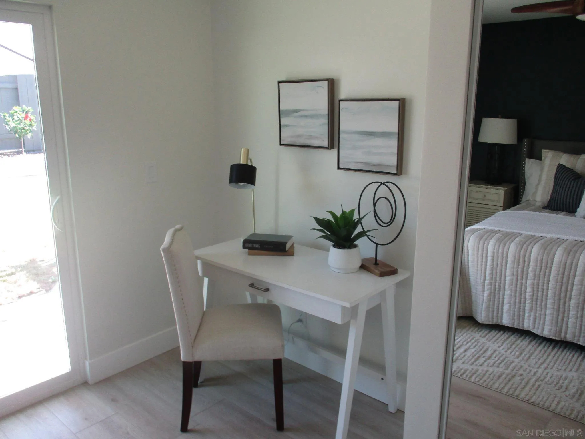 141 Solace Court Encinitas, CA 92024 - Photo 11 of 16 a dining room with furniture and wooden floor