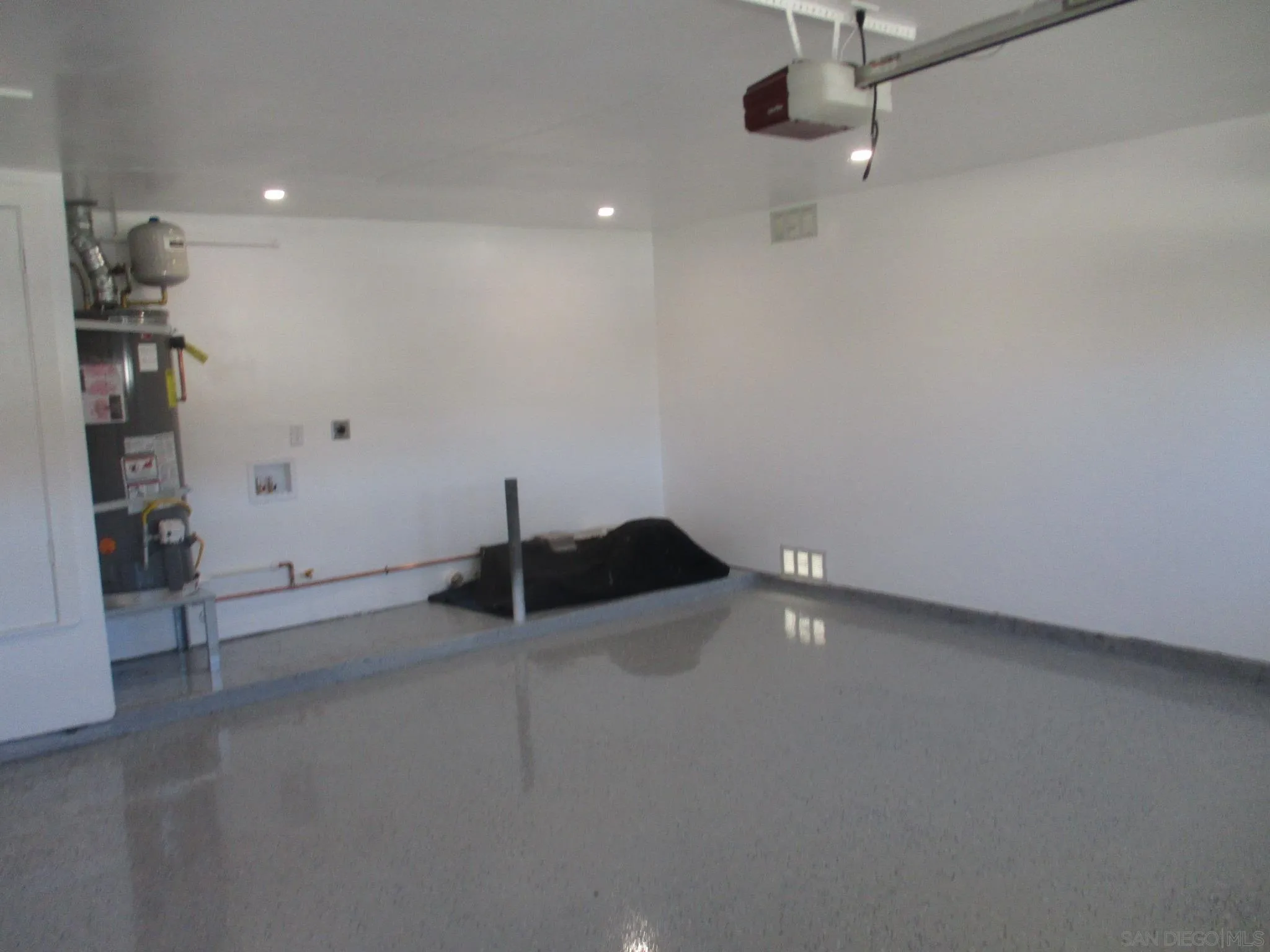 141 Solace Court Encinitas, CA 92024 - Photo 14 of 16 a view of an empty room with a window