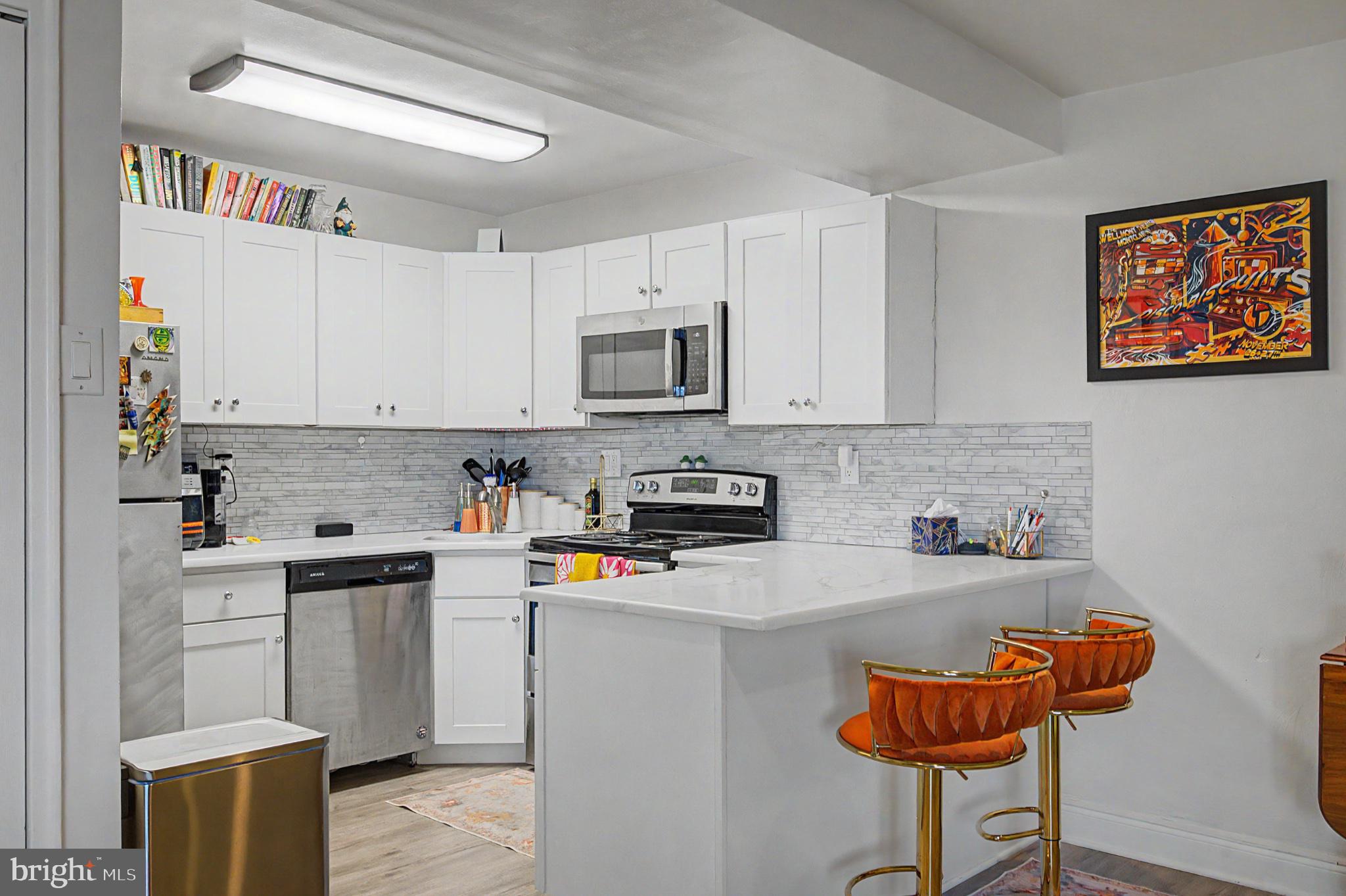 101 South Raleigh Avenue Atlantic City, NJ 08401 - Photo 13 of 26 Modern kitchen with vibrant accents.