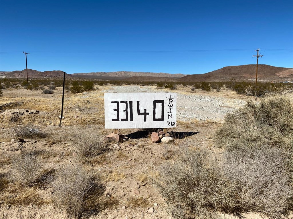 33140 Irwin Road Barstow, CA 92311 - Photo 1 of 1 a view of a house with a yard