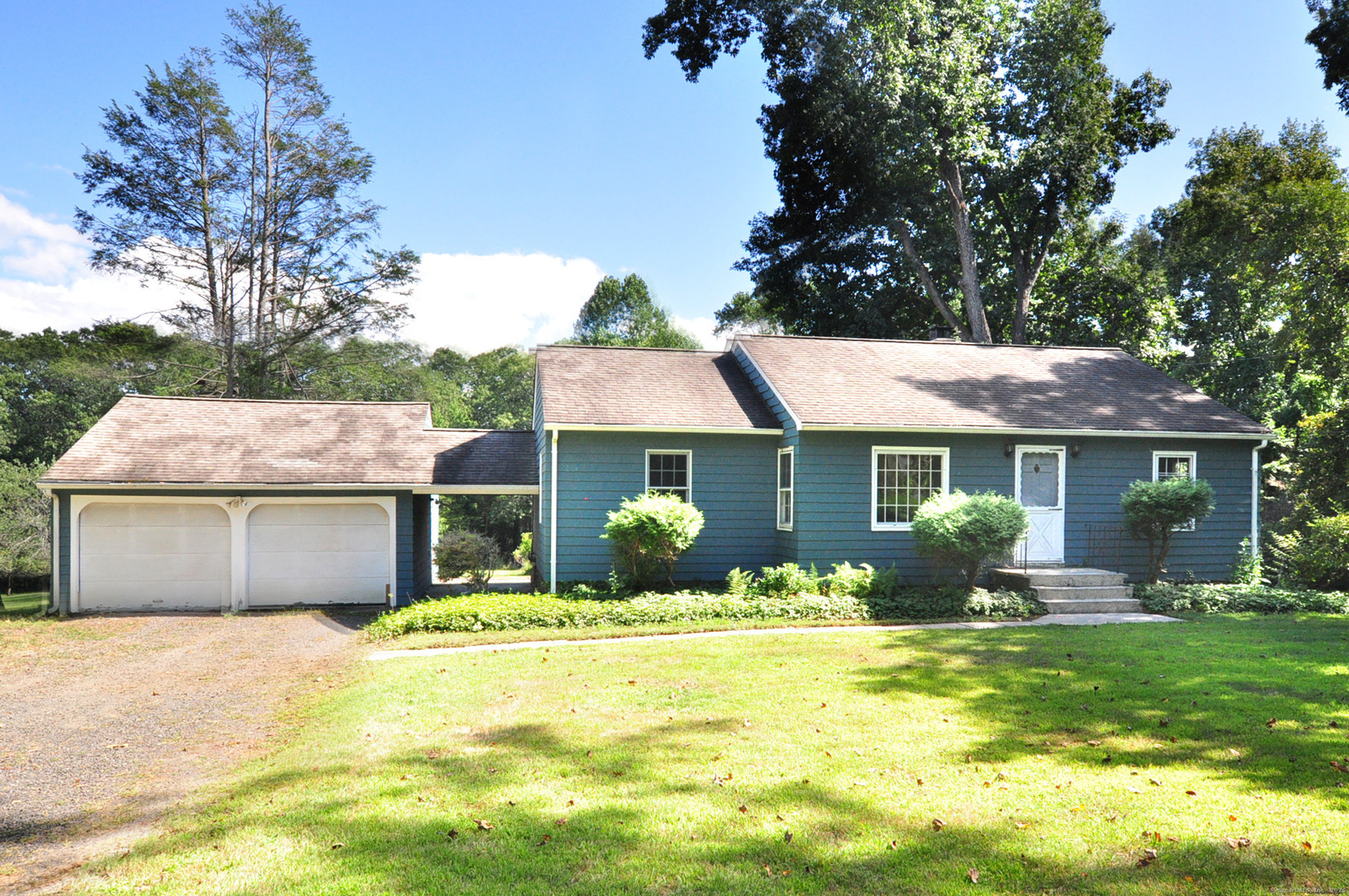 73 Botsford Road Seymour, CT 06483 - Photo 1 of 1 a front view of a house with a garden