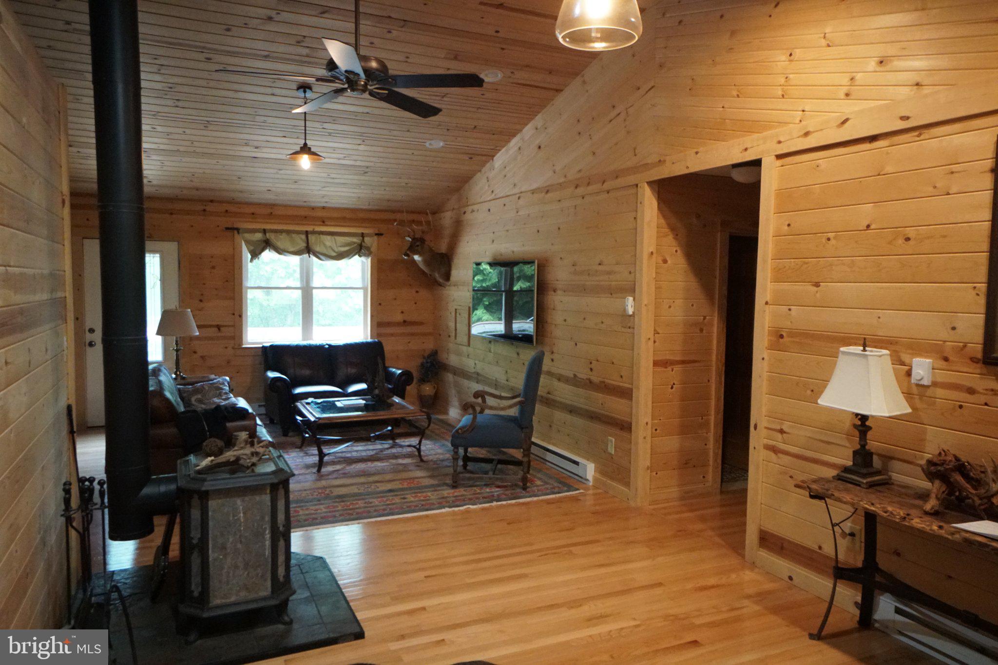 150 Sharp Ridge Lane Franklin, WV 26807 - Photo 20 of 69 Cozy cabin retreat with rustic charm.