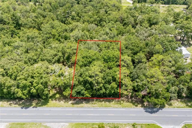 a view of a yard with an empty space