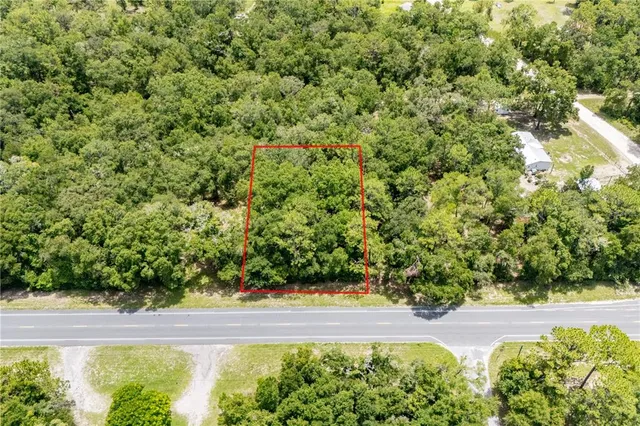 a view of a yard with an outdoor space