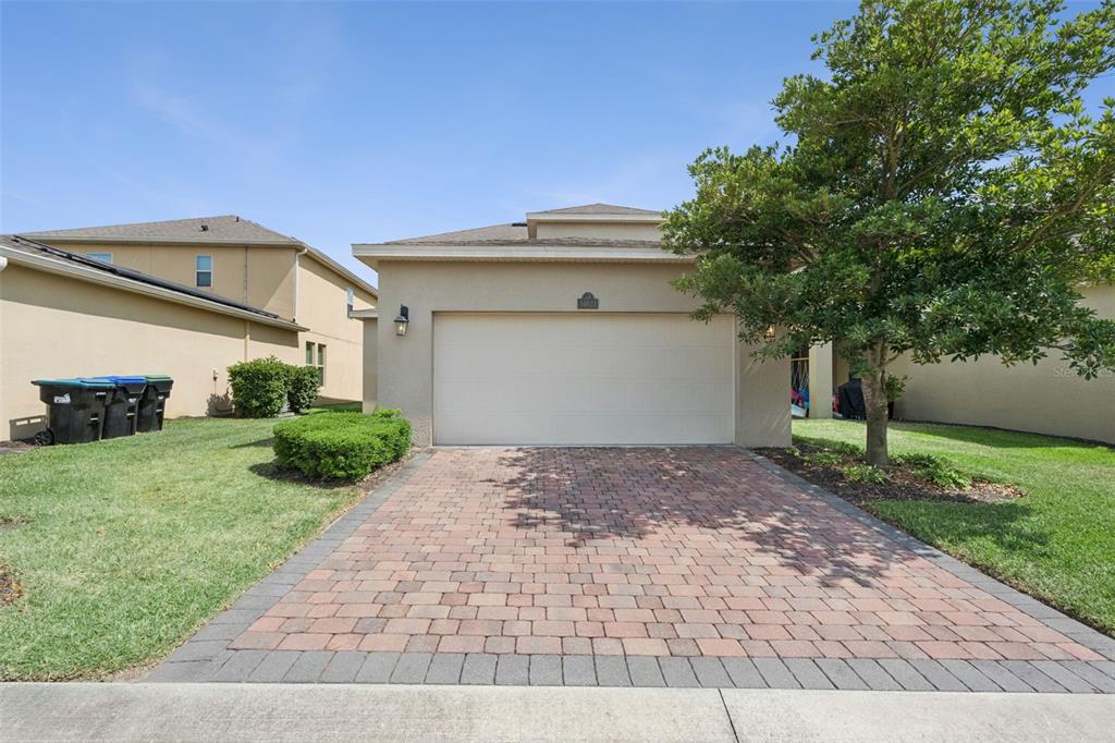 16031 Pebble Blf Loop Winter Garden, FL 34787 - Photo 29 of 51 a view of a house with a yard