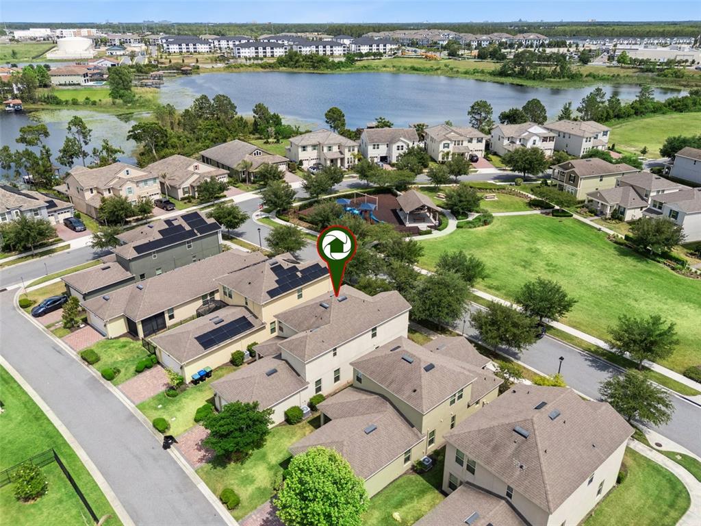 16031 Pebble Blf Loop Winter Garden, FL 34787 - Photo 31 of 51 an aerial view of a house with a lake view