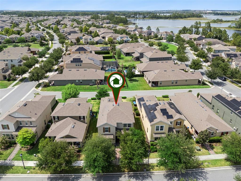 16031 Pebble Blf Loop Winter Garden, FL 34787 - Photo 32 of 51 an aerial view of residential houses with outdoor space and river