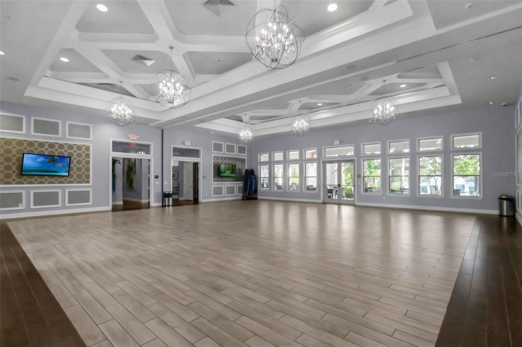 16031 Pebble Blf Loop Winter Garden, FL 34787 - Photo 36 of 51 a view of an empty room with a window and wooden floor