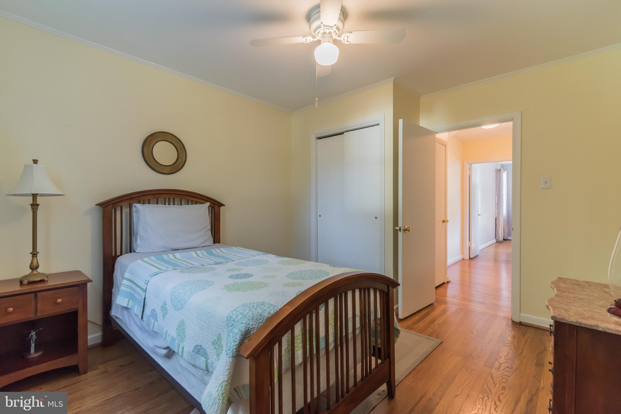 1376 Michael Road Jenkintown, PA 19046 - Photo 17 of 30 a bedroom with a bed and wooden floor