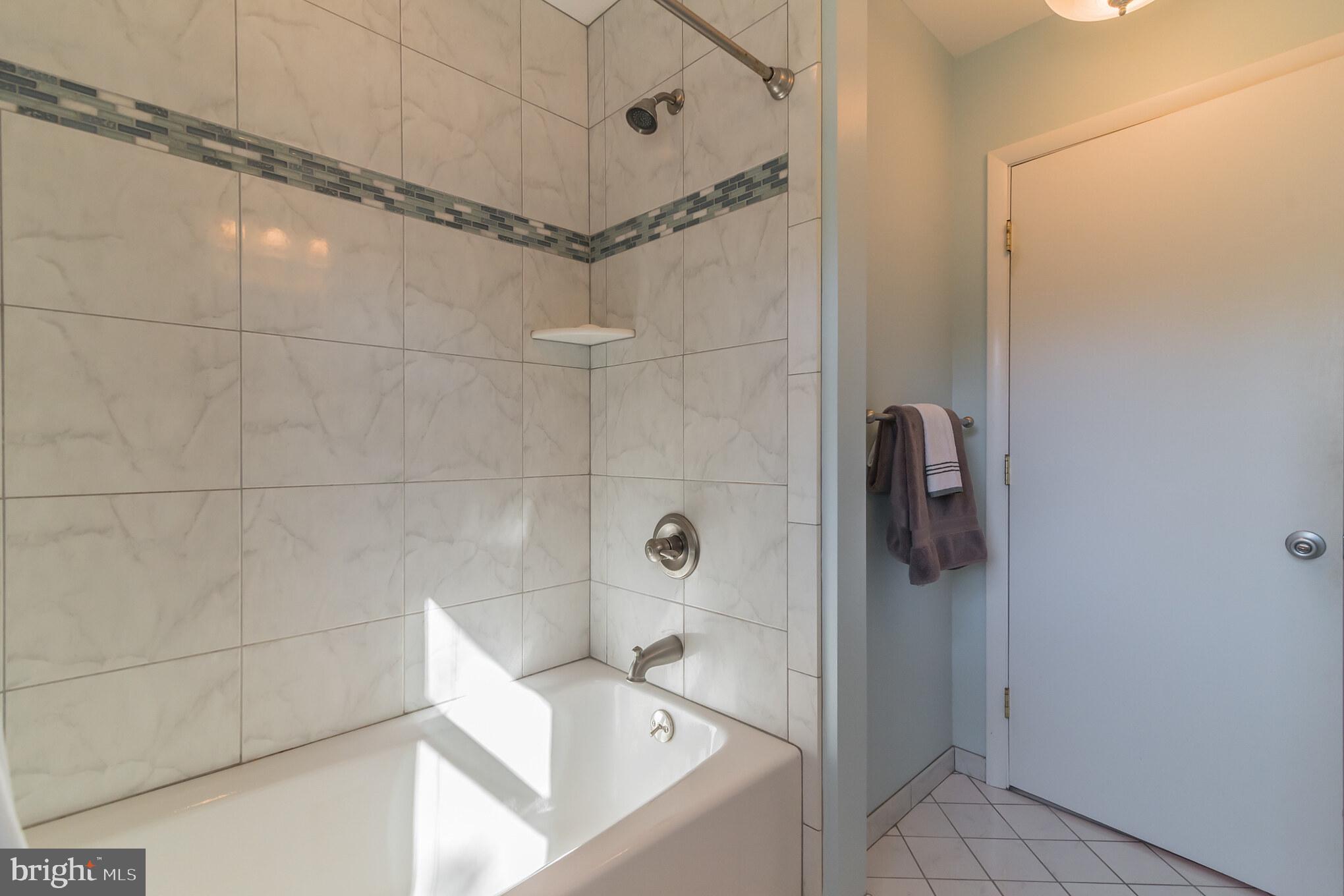 1376 Michael Road Jenkintown, PA 19046 - Photo 19 of 30 a bathroom with a bathtub and shower