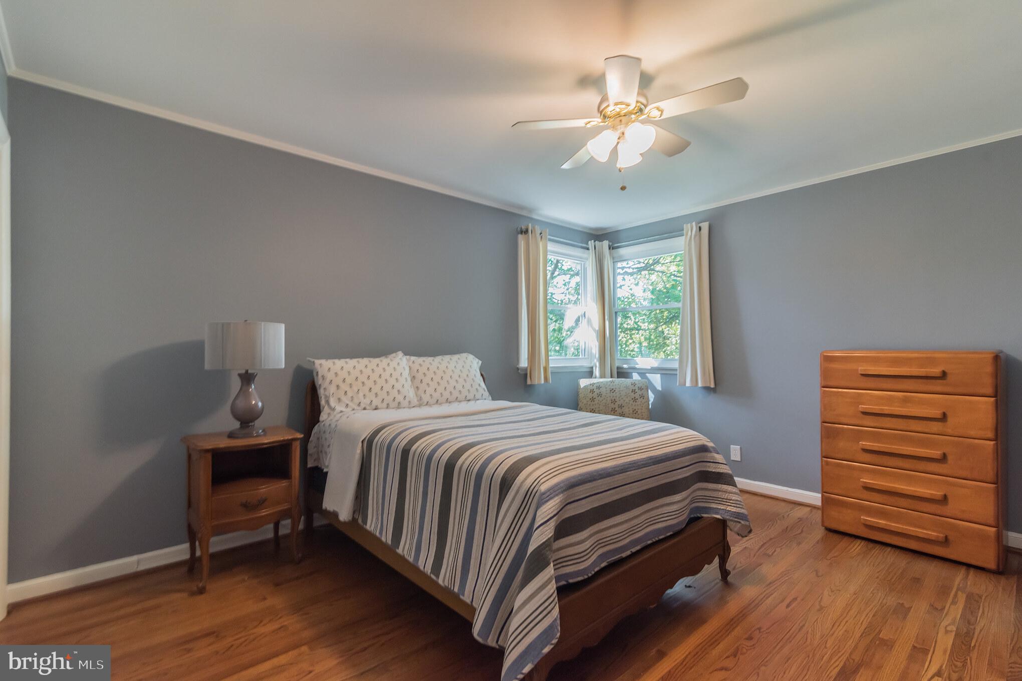 1376 Michael Road Jenkintown, PA 19046 - Photo 20 of 30 a bedroom with a bed and a chandelier