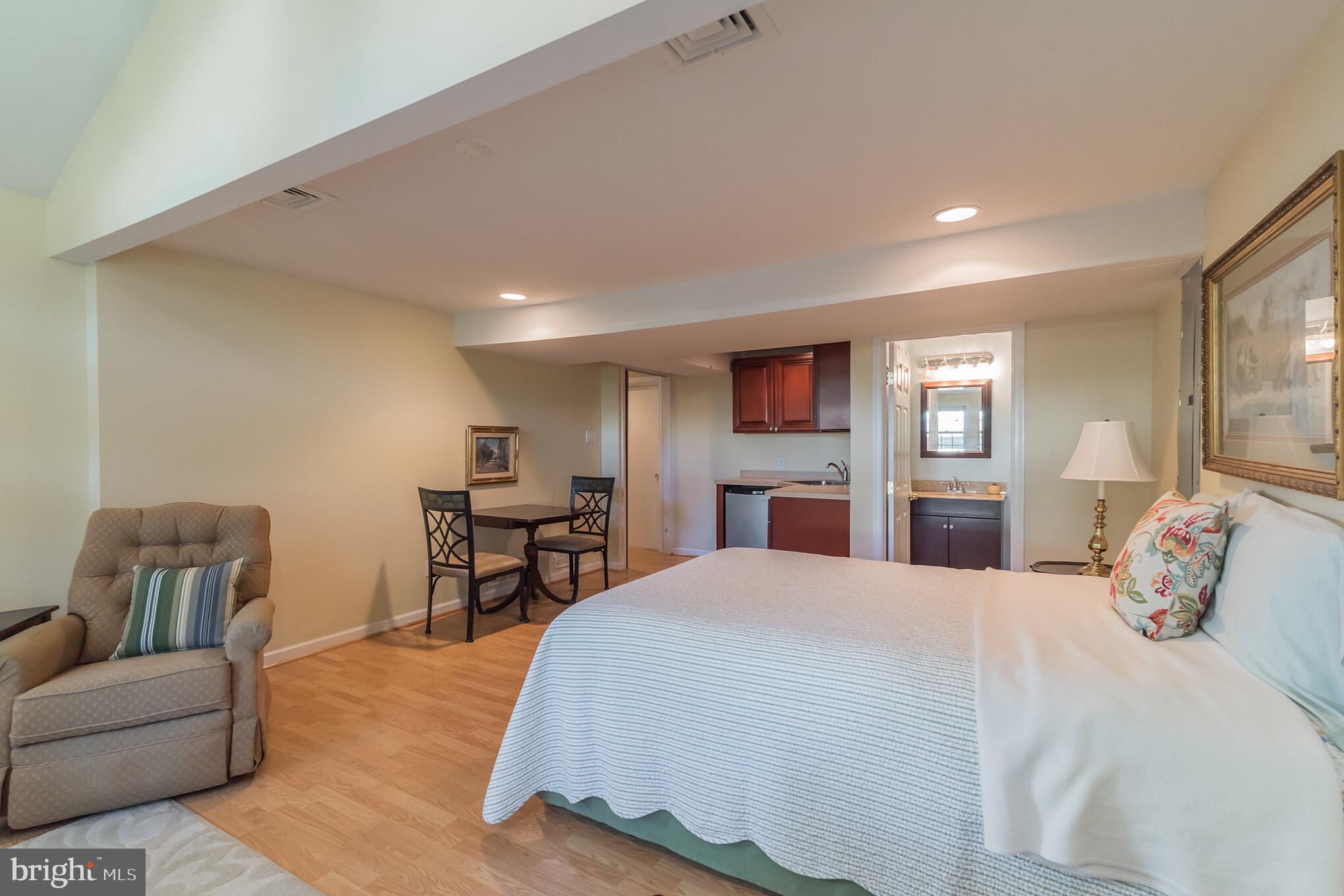 1376 Michael Road Jenkintown, PA 19046 - Photo 26 of 30 a bedroom with a large bed and wooden floor